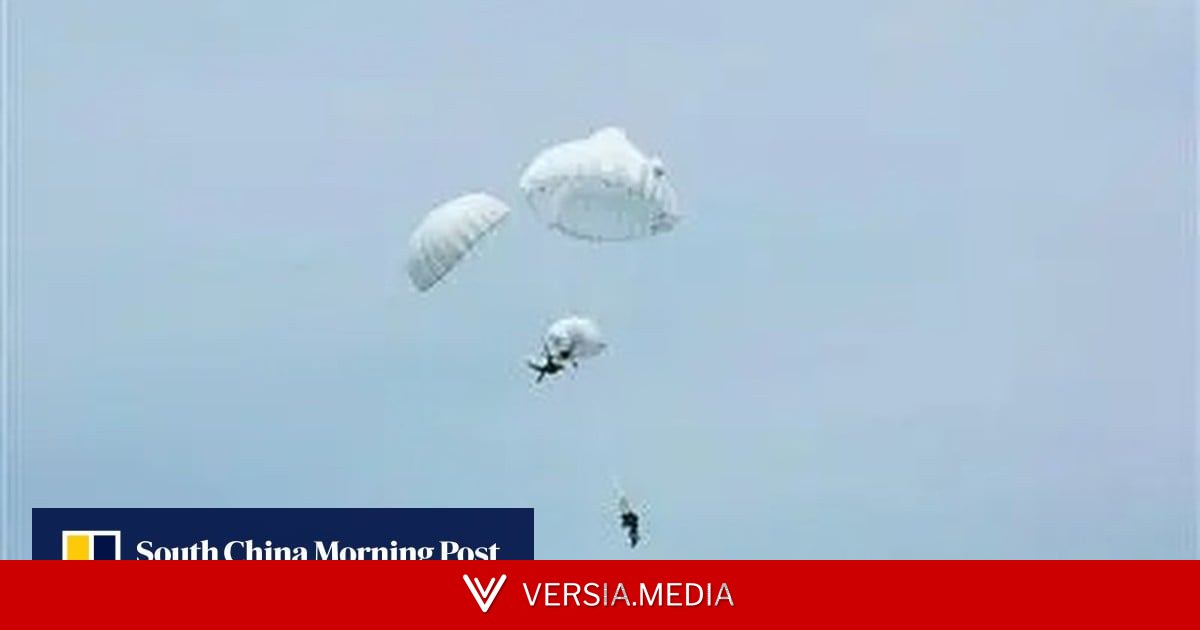 Chinese paratrooper saves unconscious comrade in dramatic mid-air chute emergency